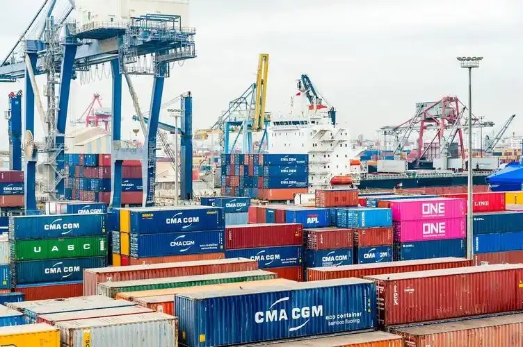 The containers piled up at the port The containers piled up at the port